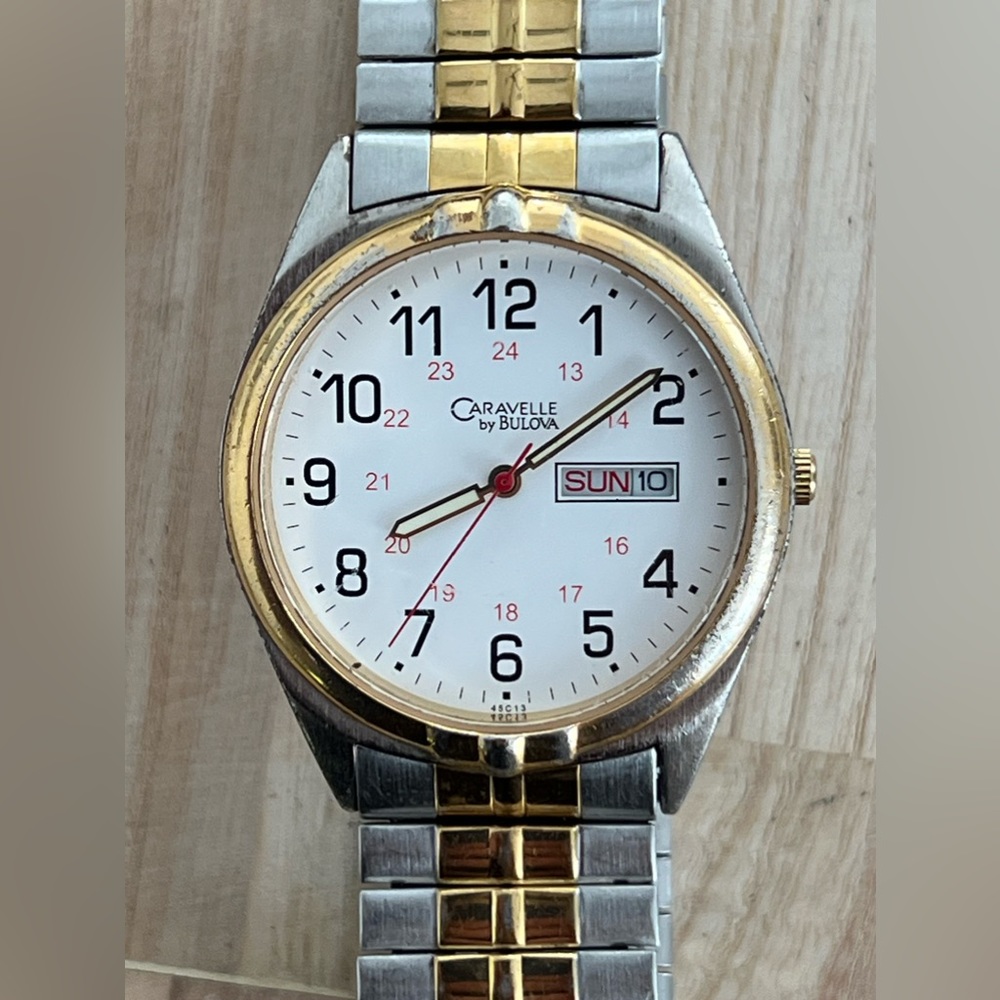 Caravelle by Bulova Men’s Watch Two Tone Stretch Bracelet White Dial Date Window